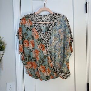 Umgee Oversized Wrap Front Mixed PrintCap Sleeve Top